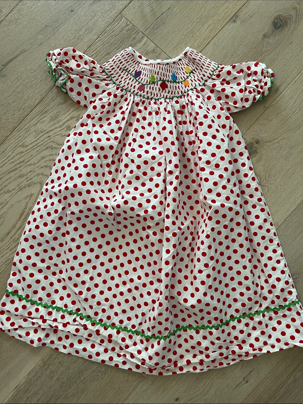 Girls White & Red Polka Dot Smocked Dress with smocked Christmas string lights
